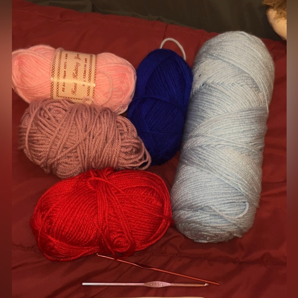 5 balls of yarn and 3 crochet hooks.